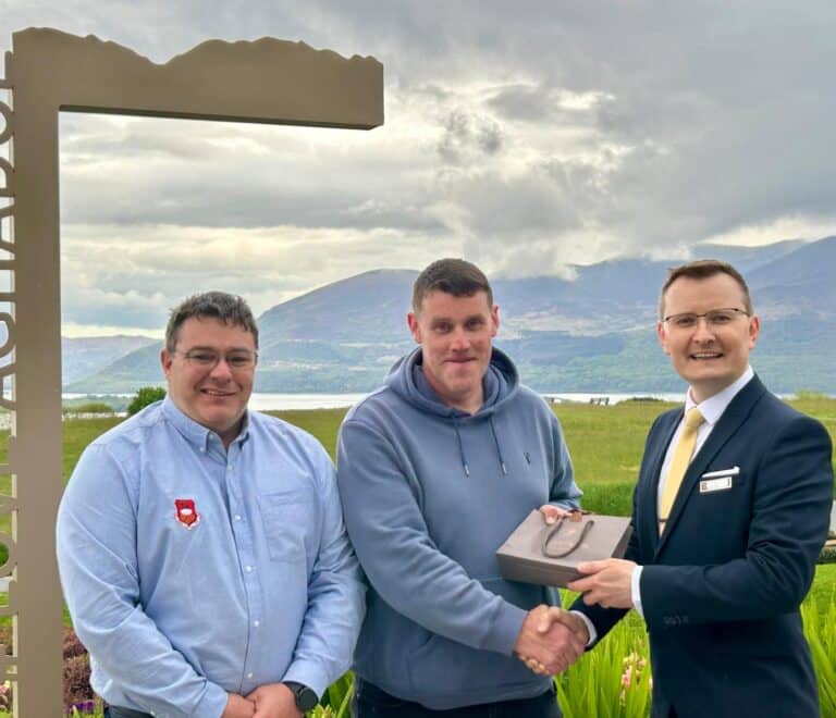 Tom Moynihan Presented with Killarney RFC Raffle Prize